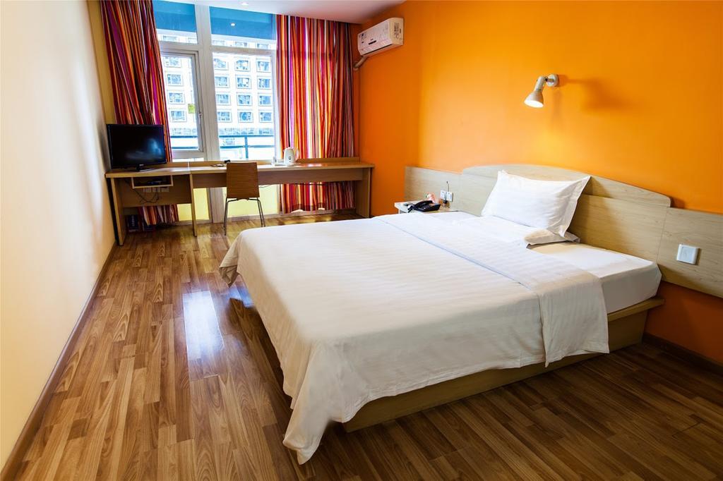 7 Days Inn Heze Mudan Road Branch Bagian luar foto